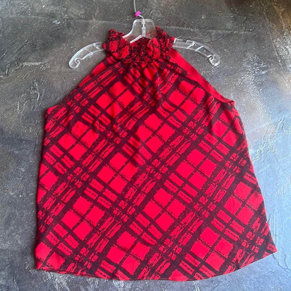 Cute sleeveless sheer top with mock neck. Red with black print. Cato Size large